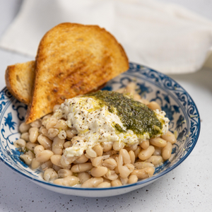 https://everydaygourmet.tv/recipes/braised-beans-with-burrata-and-pesto