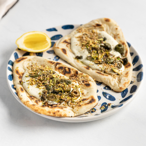 https://www.goodchefbadchef.com.au/recipes/whipped-fetta-olives-dukkah-on-naan